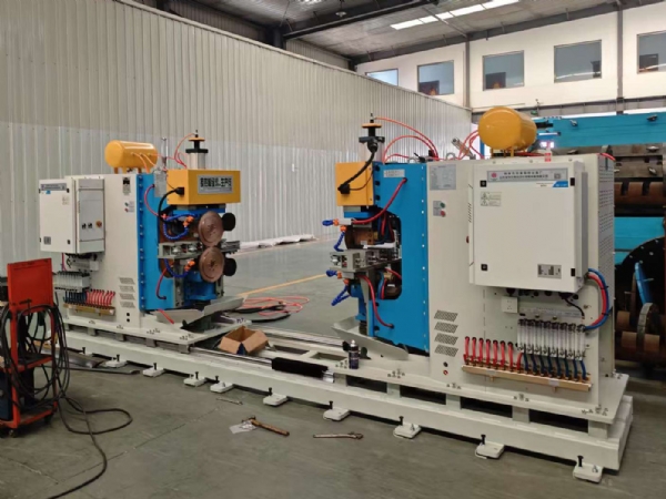 板式换热器板片直缝焊机顺利交付_山东炬源焊接设备